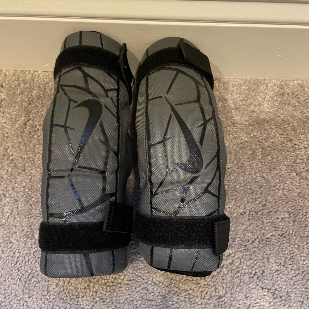 Nike Gray lacrosse elbow Guards with Black Straps - youth small